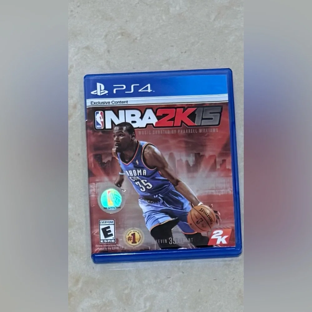 Sony NBA 2K15 PS4 Game - Blue and Red Cover Rated: E booklet included 2014